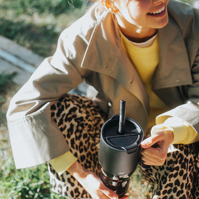26oz-rise-tumbler-with-straw-lid-c8 26oz_rise_tumbler_black_woman_topview_square.jpg