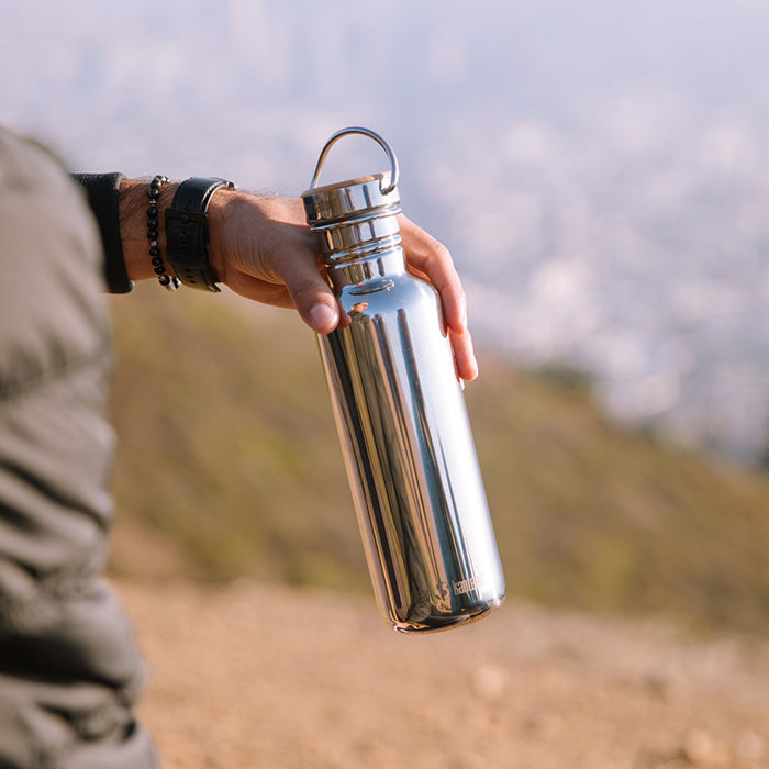 27oz-reflect-with-bamboo-cap-k0 K27SSLRF-MS-BAMBOO_reflect_bottle_hand_lifestyle.jpg