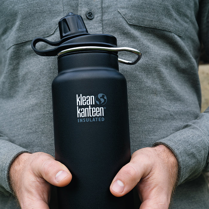 tkwide-chug-cap-j4 K32TKWSSL-SB-Craddled-Bottle_closeup_lifestyle.jpg