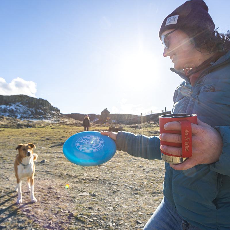 12oz-camp-mug-g7 insulated_camp_mug_12oz_woman_dog_frisbee_square.jpg