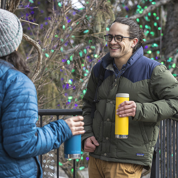 20oz-tkwide-with-cafe-cap-e4 tkwide_20oz_insulated_tumbler_cafe_winter_man_coat_yellow_square.jpg