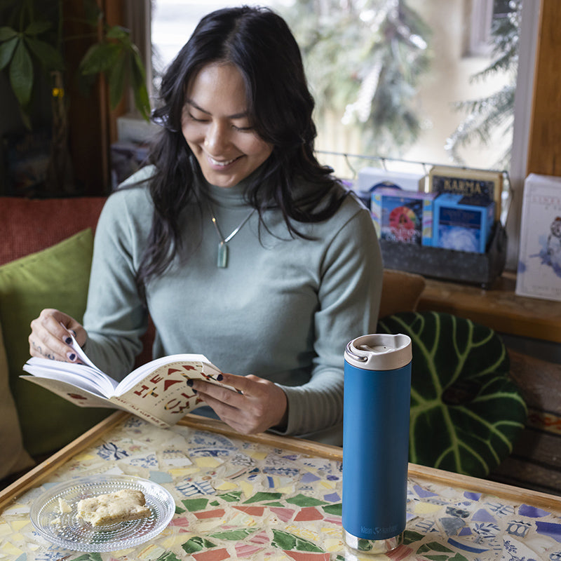 20oz-tkwide-with-cafe-cap-e4 tkwide_20oz_insulated_tumbler_cafe_woman_reading_square.jpg