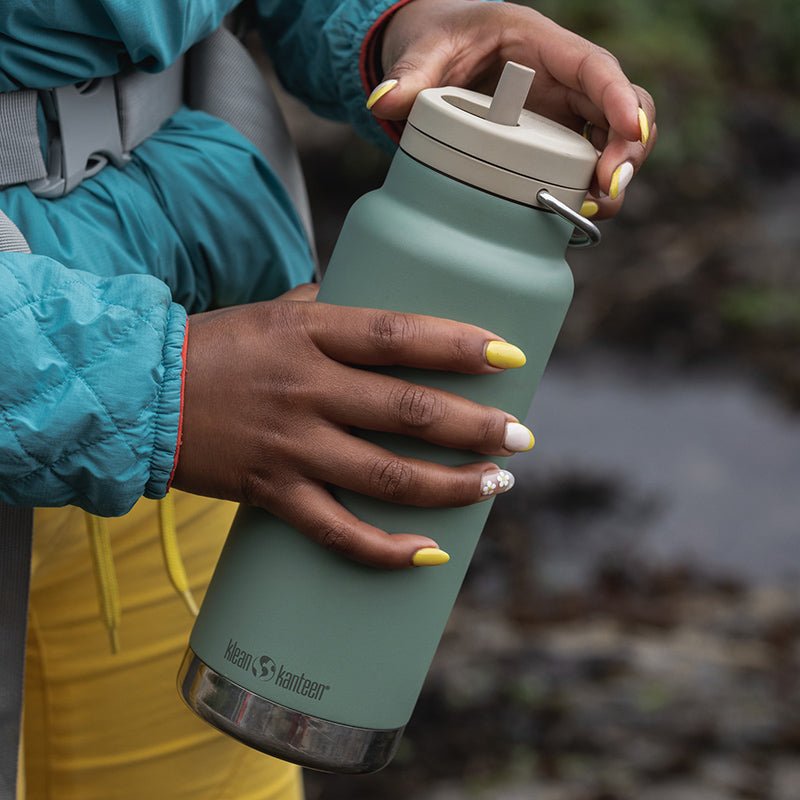 32oz-tkwide-made-to-do-more-bundle-m6 tkwide_32oz_insulated_bottle_twist_closeup_seapsray_hand_square.jpg