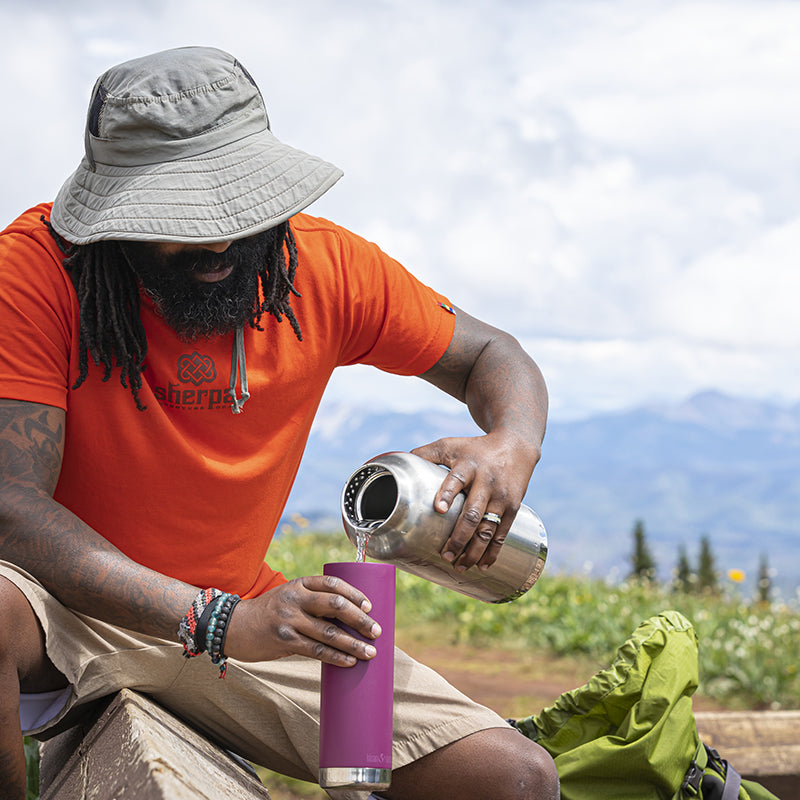 64oz-tkwide-with-loop-cap-f5 tkwide_64oz_bottle_backpacker_mountains_filling_square.jpg