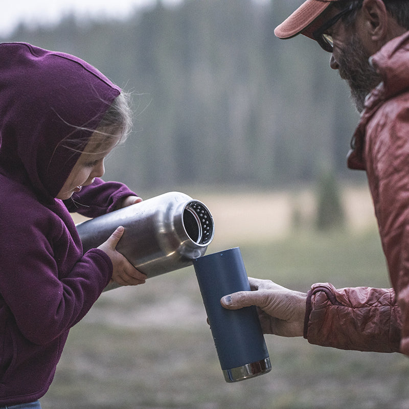 64oz-tkwide-with-loop-cap-f5 tkwide_64oz_bottle_girl_dad_filling_square.jpg